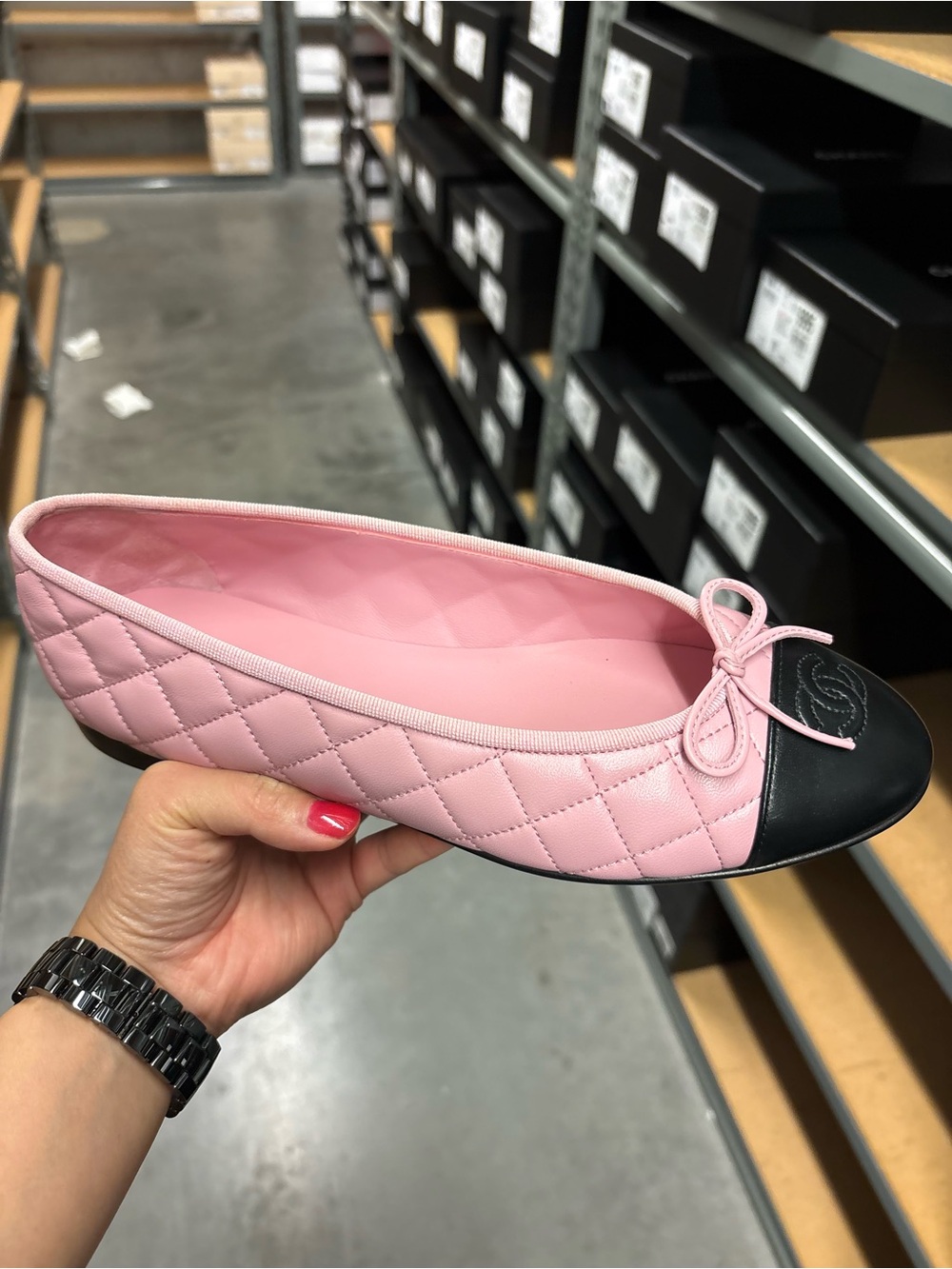 CHANEL Pink Quilted Leather Ballet Flat with Black Cap Toe and Bow
